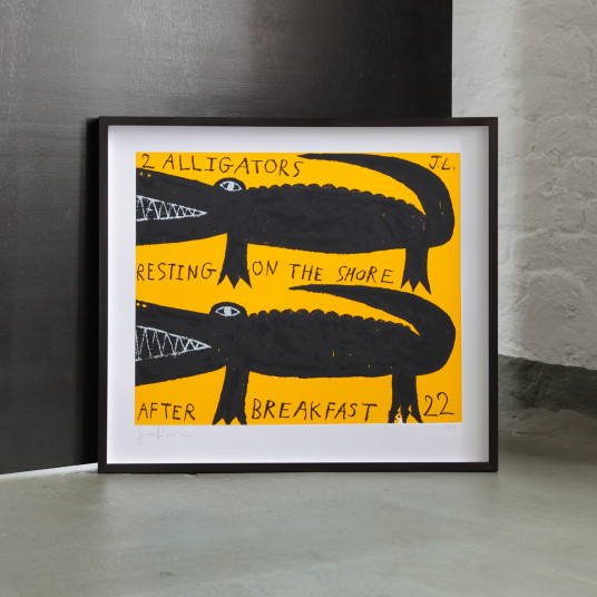 2 alligators resting on the shore after breakfast - yellow