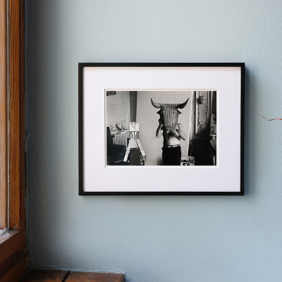 Edward Quinn, Pablo Picasso with a wicker mask originally intended for bullfighters' training. La Californie, Cannes 1959